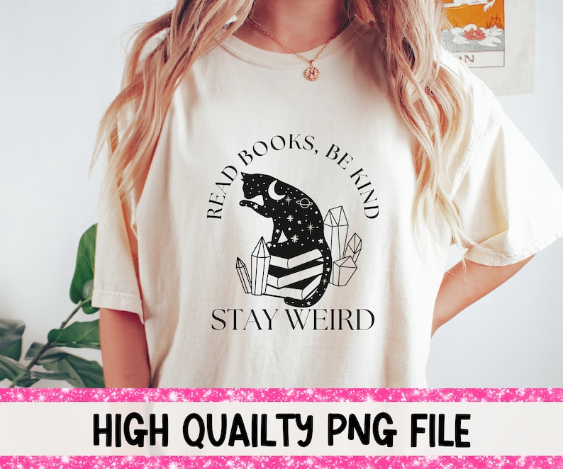 May include: A white t-shirt with a black cat illustration and the text "Read Books, Be Kind, Stay Weird".