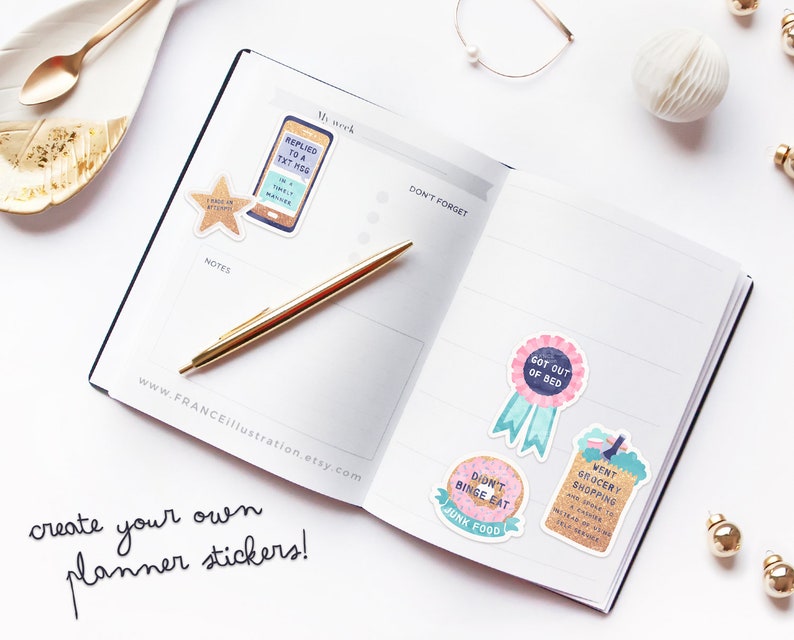 May include: A set of colorful planner stickers with various designs and text, including "Replied to a txt msg", "Got out of bed", "Didn't binge eat junk food", and "Went grocery shopping". The stickers are on a white background with a gold pen and a planner.