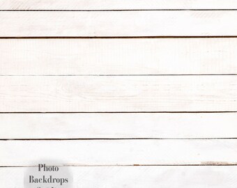 May include: White wooden backdrop with horizontal planks. The planks have a slightly distressed appearance, with visible wood grain and subtle variations in colour. The text "Photo Backdrops Studio" is visible in the lower left corner.