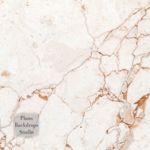 May include: White marble background with brown veins. The marble has a smooth, polished surface. The background is ideal for product photography or digital design.