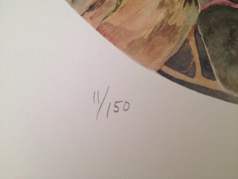 May include: Watercolor painting fragment featuring botanical elements in shades of green, brown, and beige. The artwork is signed and numbered 11/150, indicating a limited edition print. The composition is set against a white background.