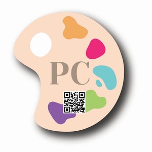 May include: A beige paint palette with a white circle, orange, pink, light blue, green, and purple paint swatches. The letters "PC" are printed in brown on the palette. A black and white QR code is also printed on the palette.