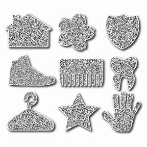 May include: Nine black and white glitter iron-on patches in various shapes, including a house, flower, shield, shoe, comb, tooth, hanger, star, and hand.