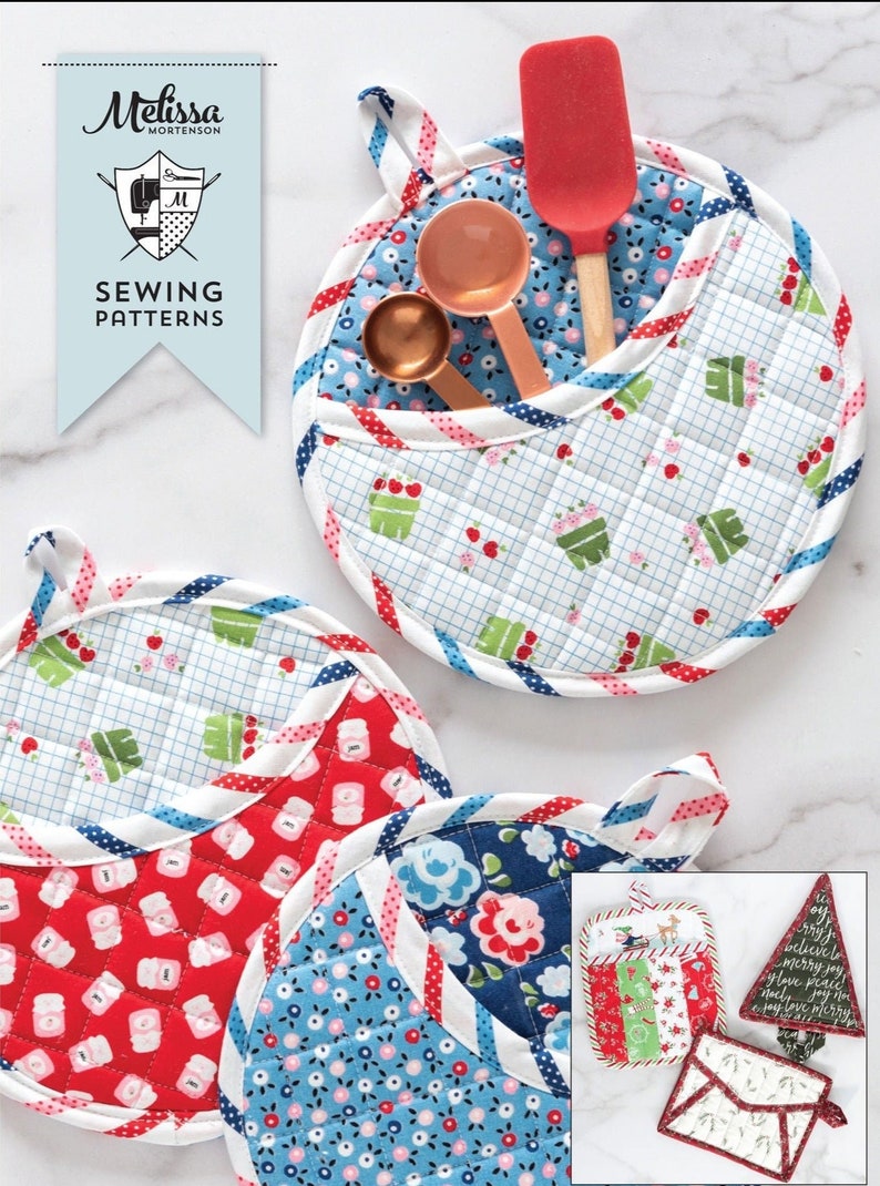 May include: Three red, blue, and white quilted pot holders with a checkered pattern. The pot holders have a pocket on the side. Two additional pot holders are in the background, one with a Christmas tree design and the other with a red and green envelope design.