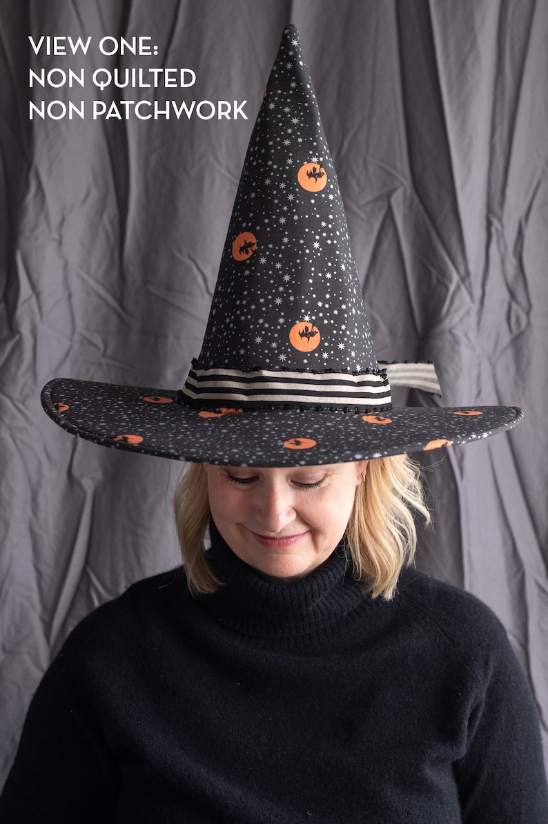 May include: A black witch hat with a pointed crown and a wide brim. The hat is decorated with orange moons and black bats on a black background with white stars. The hat has a black and white striped ribbon around the base of the crown.