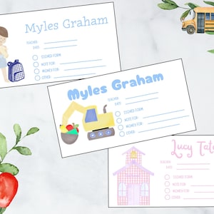 May include: Three watercolor-style school-themed cards. Two cards read "Myles Graham" in blue, with illustrations of a boy with a teddy bear and a yellow excavator. A pink card reads "Lucy Tate" with a schoolhouse illustration.