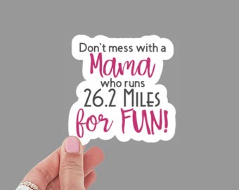 May include: White sticker with pink text that reads "Don't mess with a Mama who runs 26.2 Miles for FUN!"