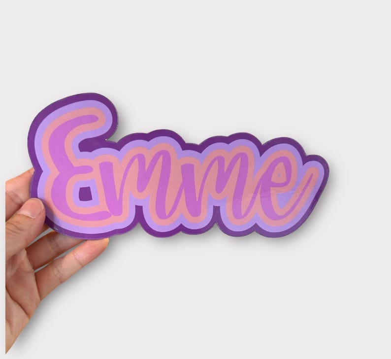 hand holding personalized sticker