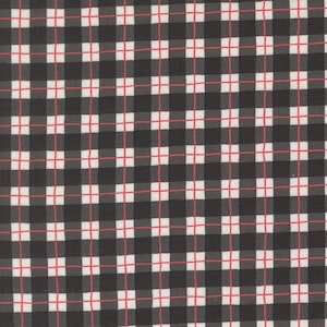May include: Close-up of a fabric with a black and white plaid pattern. The plaid design features a grid of black squares, white squares, and thin red lines. The fabric has a smooth texture and a classic, timeless look.
