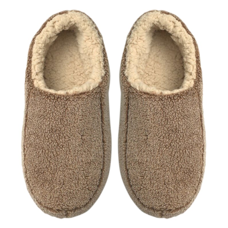 a pair of slippers with Fabric upper and super soft Sherpa lining for warmth and comfort for your older men feet