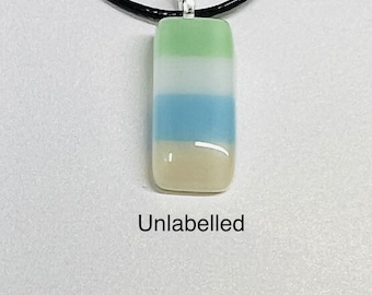 Unlabelled pride pendant fused glass handmade with Free UK postage. lgbt unlabeled lgbtq+ pride love wins