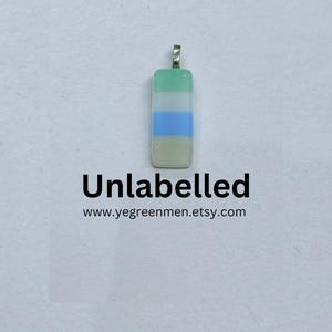Unlabelled pride pendant fused glass handmade with Free UK postage. lgbt unlabeled lgbtq+ pride love wins