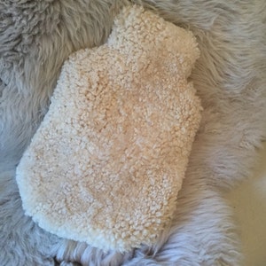 Sheepskin hot water bottle cover 'Hottie' natural oyster coloured curly sheepskin. Create hygge !
