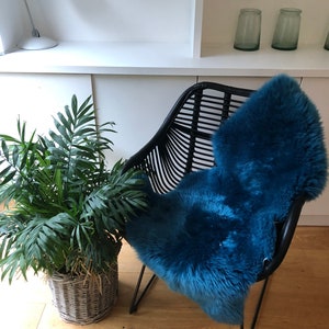 blue sheepskin rug , green sheepskin rug, deep sea green fur rug, fur chair cover, bed throw, interior accessories , deepblue green throw, s