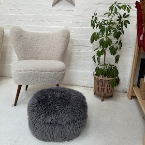 Dark grey curly sheepskin pouffe, sheepskin footstool, dark grey pouffe, sheepskin footstool, interior accessory , interior decor, pouffe,