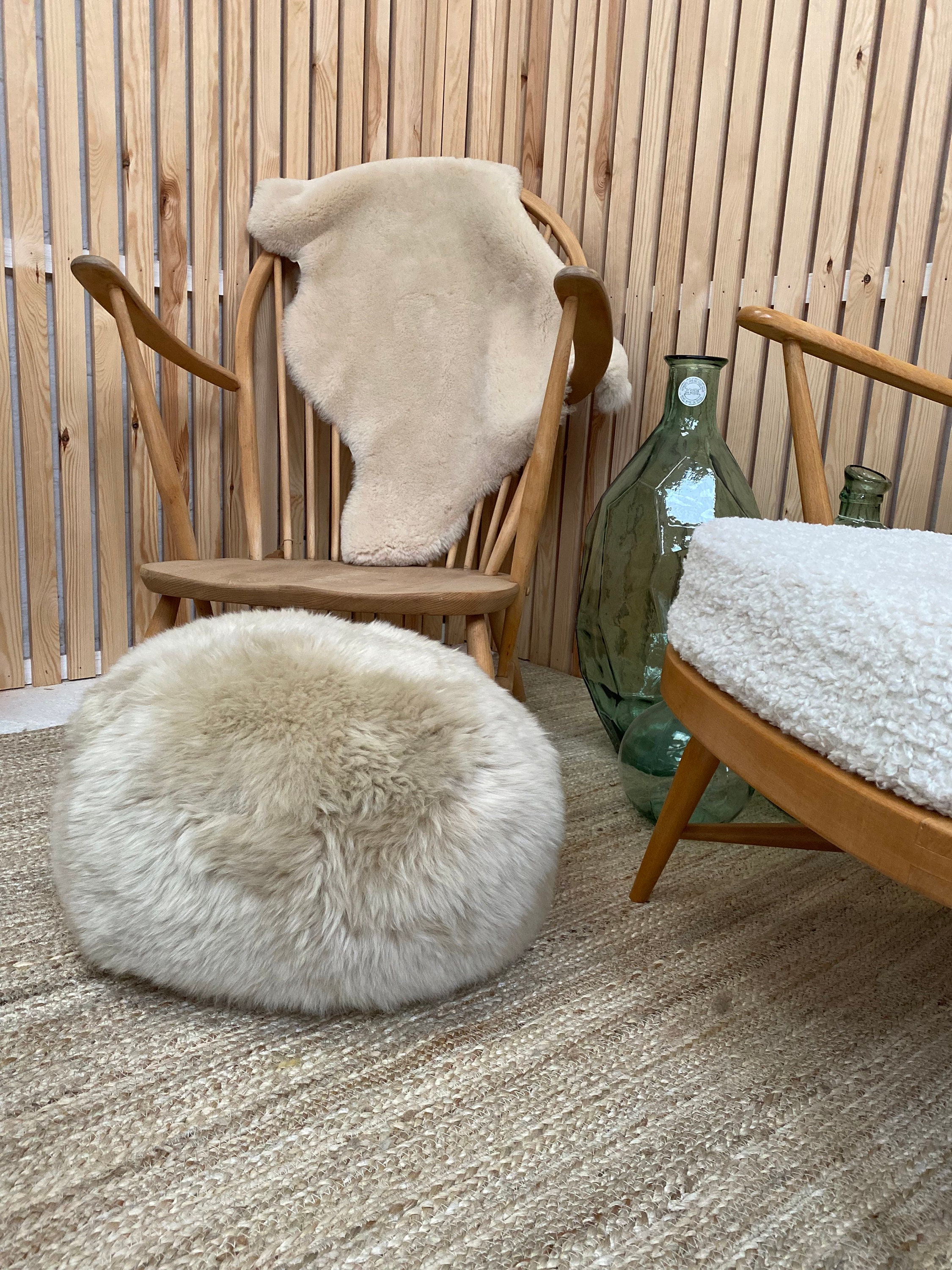 Cream colored pouf deals