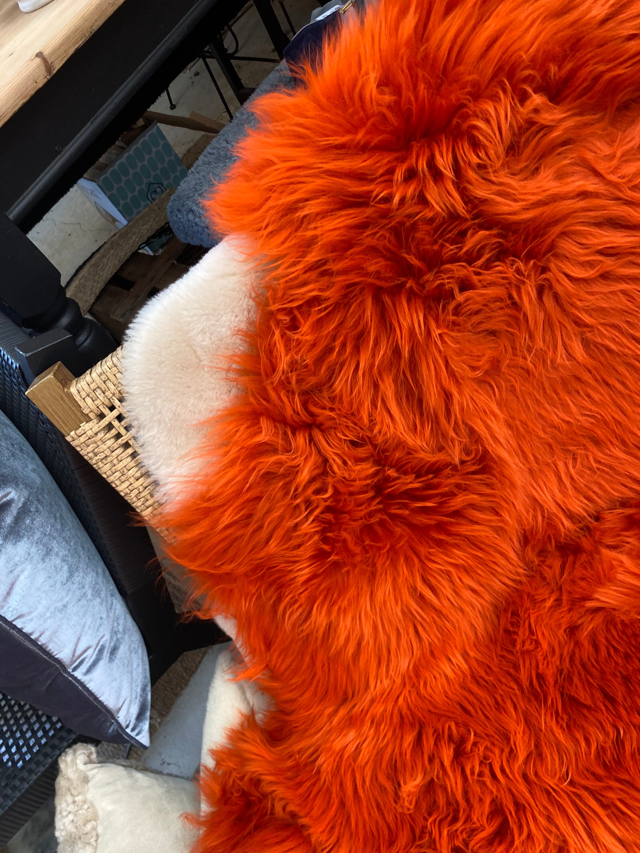 Large square seatpad . Dark orange seatpad . Sheepskin seat pad