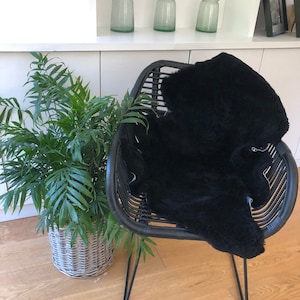 Black shearling sheepskin, upholstery fabric, black sheepskin, interior decor, interior accessories, chair cover, bed throw, hygge, black fu