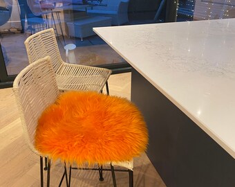 Orange sheepskin seatpad,