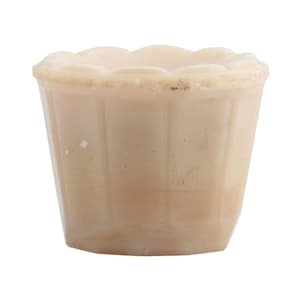 May include: A small, light beige, translucent glass vessel with a fluted, vertical-ribbed exterior and a scalloped, wavy rim. The material features a marbled, cloudy appearance with subtle variations in tone throughout the cylindrical body.