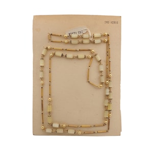 Lange vintage Tsjechische schakelketting van 52 inch met satijnen atlaszilver beklede topaasglaskralen