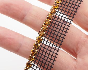 Preciosa SS22, topaz 1 meter rhinestone black mesh, strand jewel golden prong setting trim banding sew embellishment