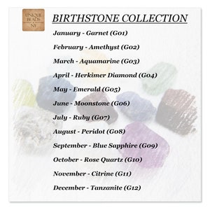 May include: A Birthstone Collection chart featuring the text UNIQUE BEADS NY and a list of twelve months paired with gemstones: Garnet, Amethyst, Aquamarine, Herkimer Diamond, Emerald, Moonstone, Ruby, Peridot, Blue Sapphire, Rose Quartz, Citrine, Tanzanite.