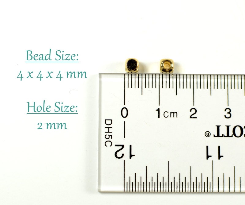 UNICRAFTALE 100 Perline Distanziali Cubiche In Ottone Placcato Oro 18K - Diametro 6mm, Foro 4mm Per Gioielli