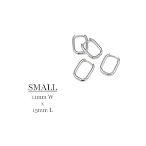 May include: Four silver rectangle hoop earrings. The earrings are 11mm wide by 15mm long. The earrings are labeled "SMALL".