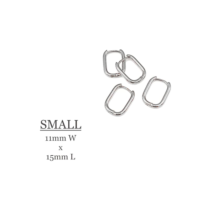 May include: Four silver rectangle hoop earrings. The earrings are 11mm wide by 15mm long. The earrings are labeled "SMALL".