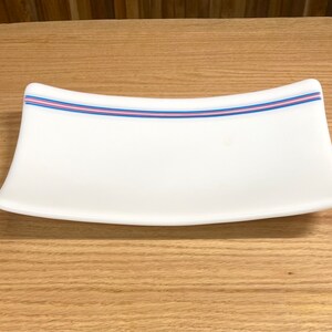 White platter with Trans Pride accent