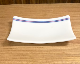 White platter with Trans Pride accent