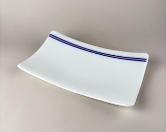 White platter with Trans Pride accent