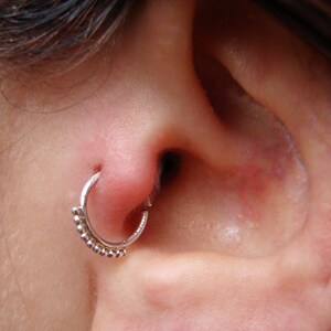 Silver helix piercing