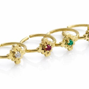 Chackana solid gold hoop piercing with a ruby/ diamond/ emerald/ topaz gemstone