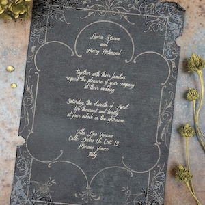 May include: A black and white wedding invitation with a decorative border. The invitation announces the wedding of Laura Brown and Henry Richmond, to be held on Saturday, April 11, 2020 at 4:00 PM at Villa Lina Venezia, Calle Dietro Gli Orti 12, Murano, Venice, Italy.