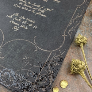 May include: Black wedding invitation with gold lettering. The invitation is for a wedding on Saturday, April 11, 2020, at 4:00 PM. The wedding will be held at Villa Lina Venezia, Calle Dietro Gli Orti 12, Murano, Venice, Italy.