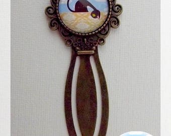Bronze cabochon page mark "The ostrich cat"