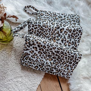 Cambiador/colchoneta de viaje/nómada para bebé - Leopardo