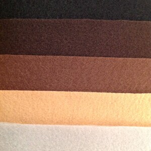 May include: Five fabric swatches in different shades of brown, from dark to light. The swatches are arranged in a vertical stack, with the darkest shade at the top and the lightest shade at the bottom.