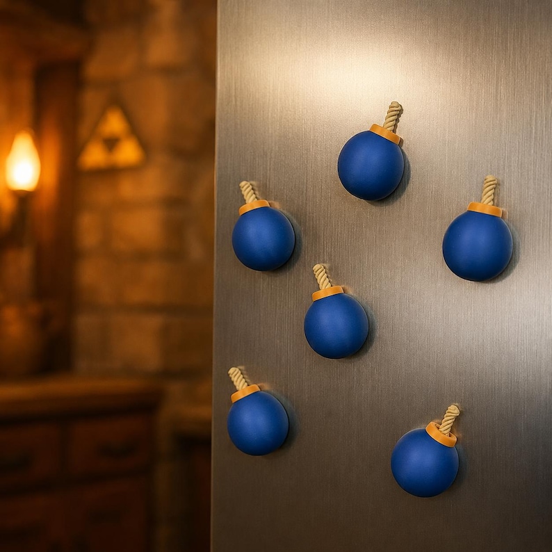 May include: A set of five spherical blue magnets, each featuring a small orange base and a short, twisted beige rope fuse extending from the top, arranged in a scattered pattern on a smooth, vertical metallic surface.