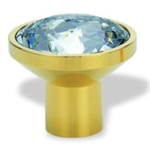 Könnte beinhalten: Ein goldfarbener Schrankknopf mit einem großen, facettierten, klaren blauen Kristall oben.