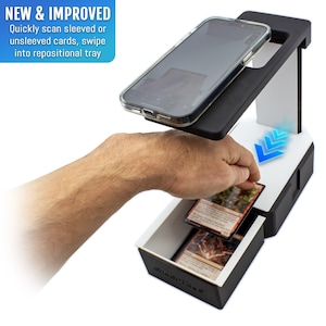 May include: A black and white card scanning device with a smartphone on top. The device is designed to scan sleeved or unsleeved cards. The text "NEW & IMPROVED" is in a blue box. A hand is placing a card into the device.