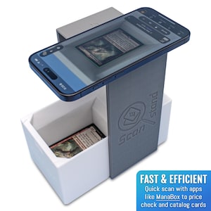 May include: A gray and white card scanning stand with a phone holder. The stand has a slot for a card to be scanned and the text "Scan stand" is printed on the side. The text "FAST & EFFICIENT" is printed below the stand. The text "Quick scan with apps like ManaBox to price check and catalog cards" is printed below the text "FAST & EFFICIENT".