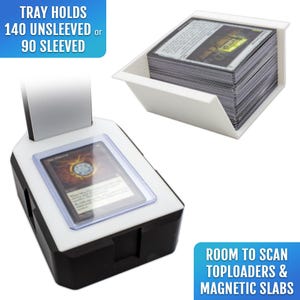 May include: A black and white card scanner with a clear plastic top, designed for scanning trading cards. The image also shows a white tray holding a stack of cards. Text on the image reads: "TRAY HOLDS 140 UNSLEEVED or 90 SLEEVED" and "ROOM TO SCAN TOPLOADERS & MAGNETIC SLABS."