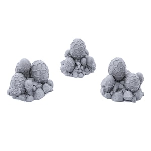 May include: Three gray, rocky terrain bases with various sized, gray, textured spheres. The spheres are arranged in a cluster on each base.