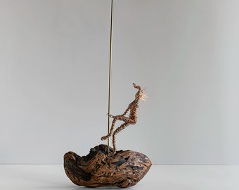 Escultura de velero de madera a la deriva: Marinero de alambre, Arte náutico