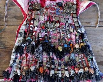 Antique Turkmen Child's Vest: Embroidered Kuchi Amulets, Tassels, Shells