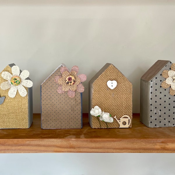 Little wooden houses. Small rustic house ornament.