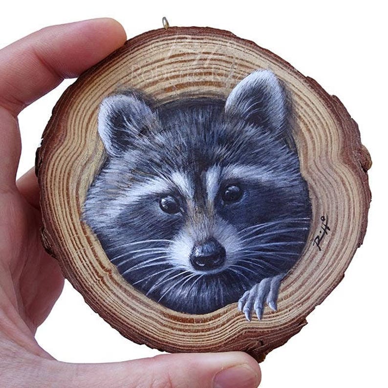 Рисунки на срезе дерева животные